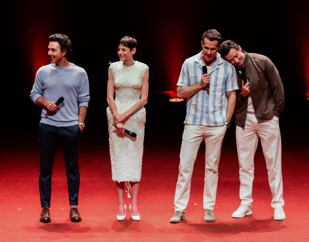 Ryan Reynolds, Hugh Jackman, Emma Corrin, and Shawn Levy at the Deadpool and Wolverine Fan Event in Rio de Janeiro.